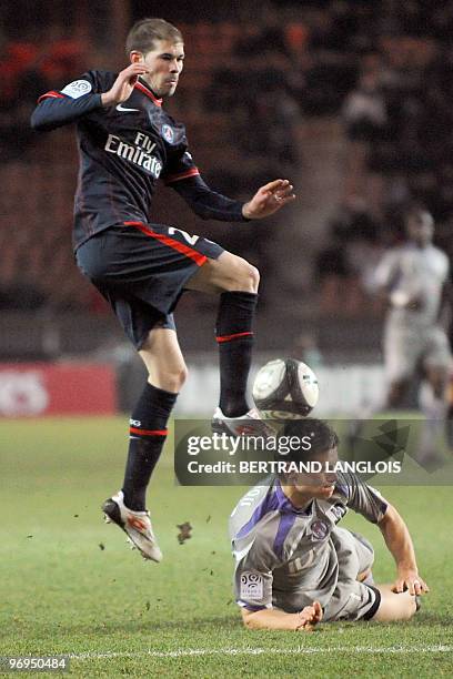 Toulouse's defender Franck Tabanou vies with Paris Saint-Germain's defender Christophe Jallet during their French L1 football match PSG v. Toulouse...