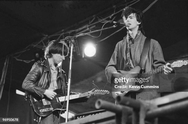 Guitarist Will Sergeant and singer Ian McCulloch of British band Echo and the Bunnymen, perform on stage at an open air festival in Leigh, England on...