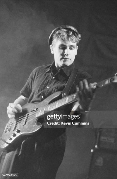 Les Pattinson, bassist of British band Echo and the Bunnymen, performs on stage at the Royal Court Theatre in Liverpool, England on December 09, 1981.