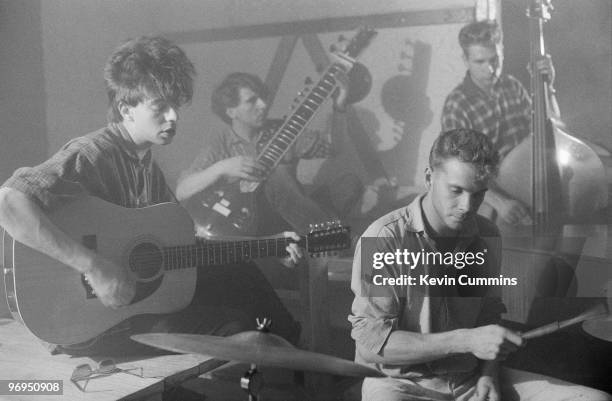 Ian McCulloch, Will Sergeant, Phil De Freitas and Les Pattinson of British band Echo and the Bunnymen perform on stage at Brian's Cafe in Liverpool,...