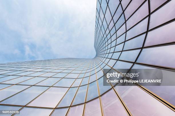 curved skyscraper against blue sky - skyscraper cloud stock pictures, royalty-free photos & images