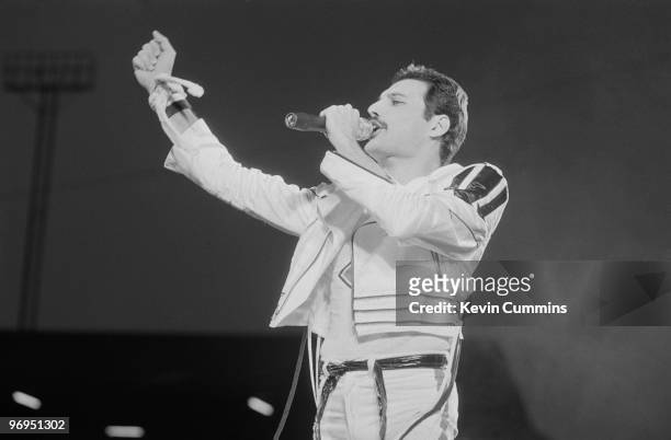 Singer Freddie Mercury of rock band Queen performs on stage Elland Road football stadium in Leeds, England on May 29, 1982.