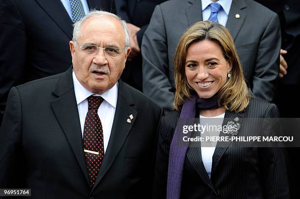 Spain's Defence Minister Carme Chacon poses nect to her Turkish counterpart Mehmet Vecdi Gonul during a family picture of a Spain-Turkey summit at...