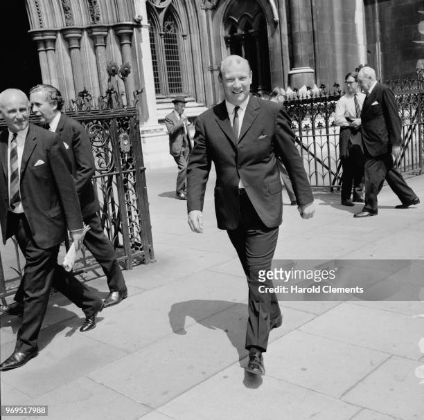 Film producer David Newman leaving the Royal Court of Justice after hearing about Richard Harris libel case, London, UK, 19th July 1967.