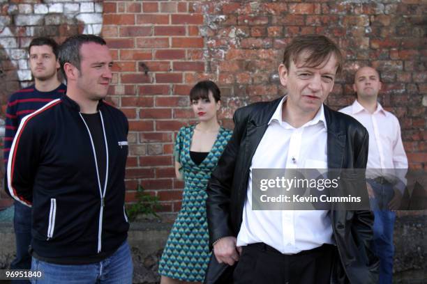 Bassist Steve Trafford, guitarist Ben Pritchard, Elena Poulou, singer-songwriter Mark E. Smith and drummer Spencer Birtwistle of British band The...