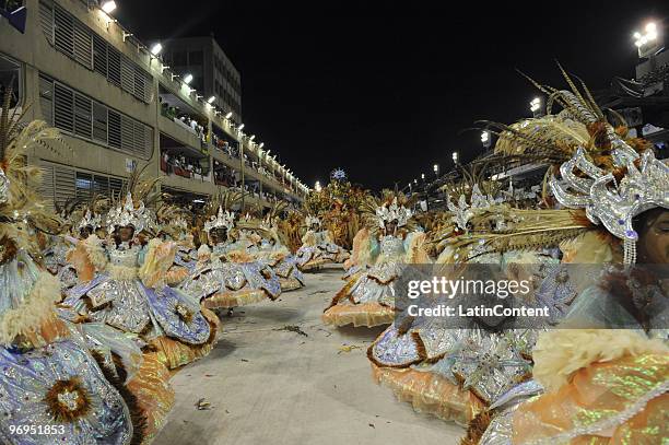 Members of Beija Flor Samba School dance during Rio de Janeiro's Carnival Champions Parade at Marques de Sapucai Sambodrome on February 21, 2010 in...