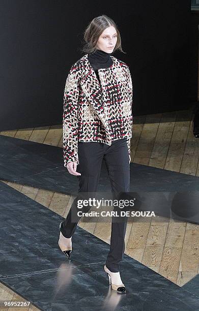 Model presents a creation by fashion designer Nicole Farhi during her show at the Royal Opera House, London during the fifth day of London Fashion...