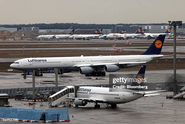 Lufthansa airplanes are seen at Rhein-Main Airport in Frankfurt, Germany, on Monday, Feb. 22, 2010. Deutsche Lufthansa AG scrapped 67 percent of...