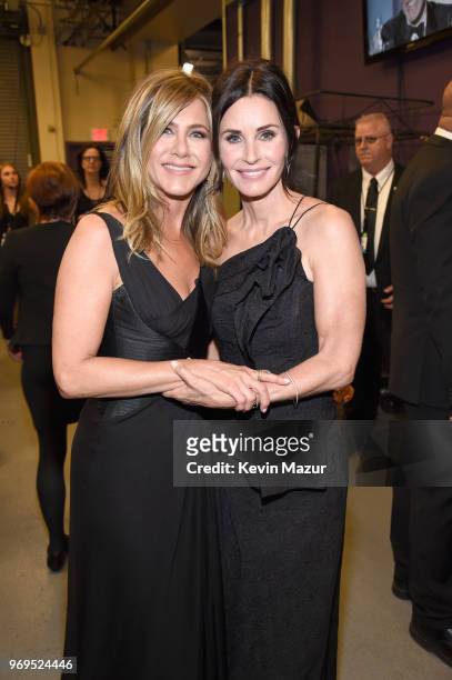 Jennifer Aniston and Courteney Cox attend the American Film Institute's 46th Life Achievement Award Gala Tribute to George Clooney at Dolby Theatre...