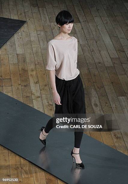 Model presents a creation by fashion designer Nicole Farhi during her show at the Royal Opera House, London during the fifth day of London Fashion...