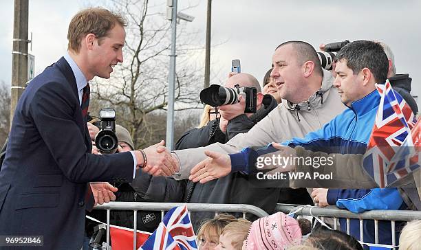 Prince William is greeted by well wishers as he departs after a visit to Alder Hey Children's Hospital, where he officially launched their new...