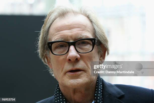 Bill Nighy poses on the front row at the Nicole Farhi show for London Fashion Week Autumn/Winter 2010 at The Royal Opera House on February 22, 2010...