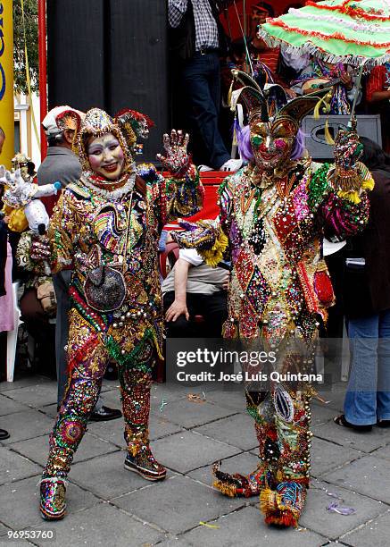 Revelers dressed as Harlequins during the celebration of La Muerte del Pepino at the General de La Paz Cemetery on February 21, 2010 in La Paz,...
