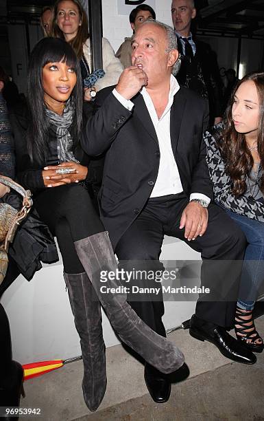 Naomi Campbell and Philip Green pose on the front row at the Christopher Kane show for London Fashion Week Autumn/Winter 2010 at TopShop Venue on...