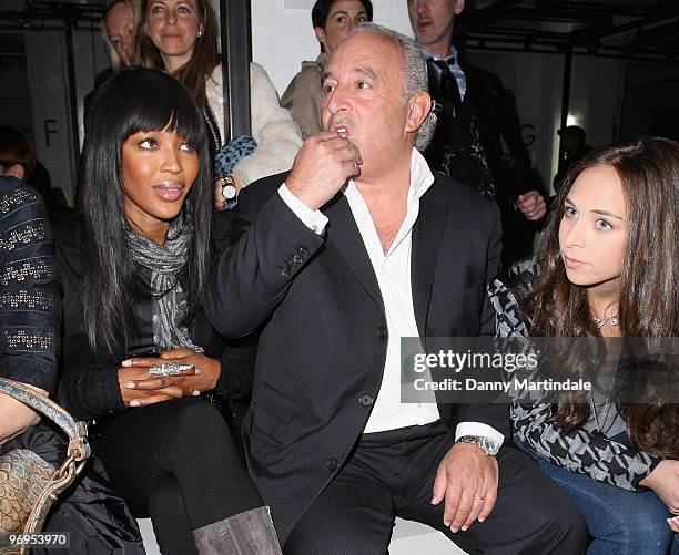 Naomi Campbell, Philip Green and Chloe Green pose on the front row at the Christopher Kane show for London Fashion Week Autumn/Winter 2010 at TopShop...