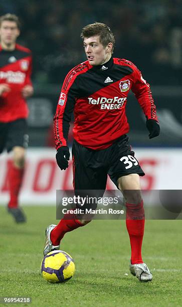 Toni Kroos of Leverkusen runs with the ball during the Bundesliga match between Werder Bremen and Bayer Leverkusen at the Weser Stadium on February...