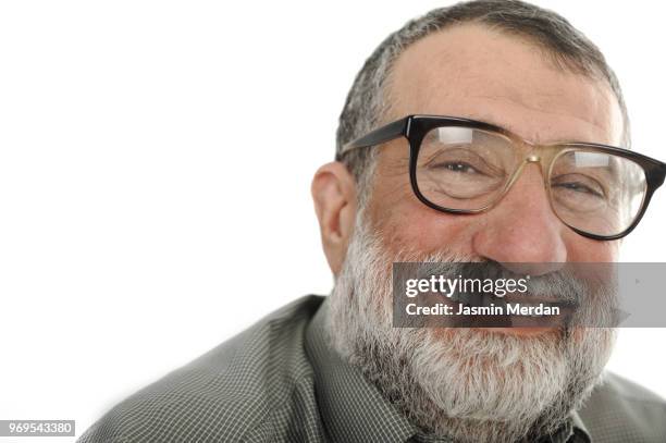 close-up portrait of senior man smiling - jasmin merdan stock pictures, royalty-free photos & images