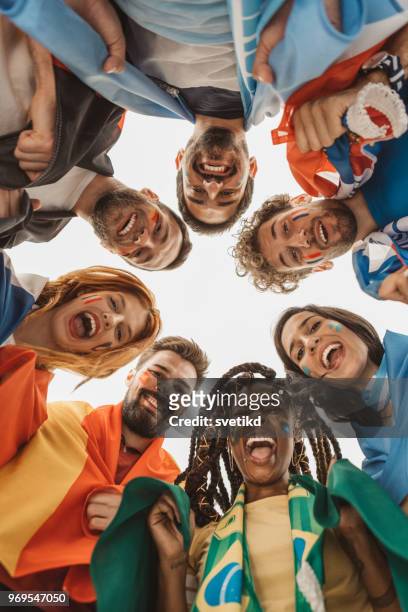 soccer fans cheering for national teams - world championship stock pictures, royalty-free photos & images