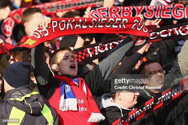 The fans of Nuernberg celebrate their team during the Bundesliga match between 1. FC Nuernberg and FC Bayern Muenchen at Easy Credit Stadium on...