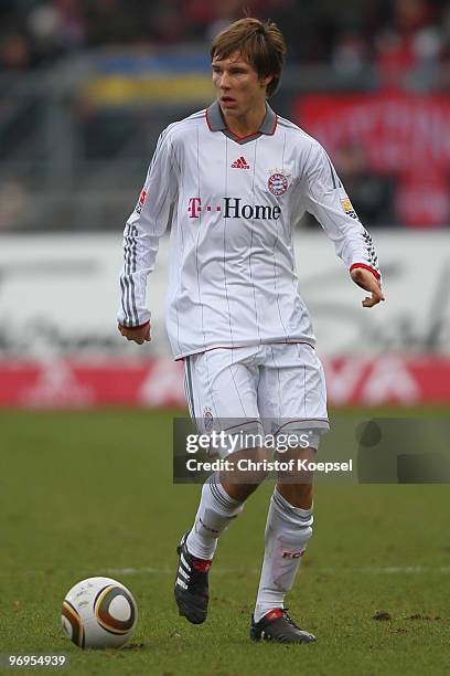 Holger Badstuber of Bayern runs with the ball during the Bundesliga match between 1. FC Nuernberg and FC Bayern Muenchen at Easy Credit Stadium on...