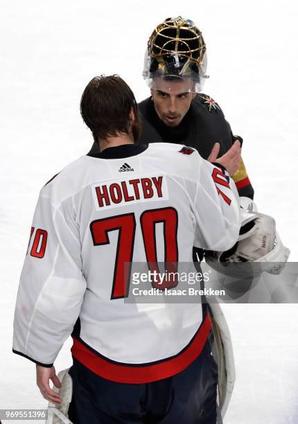 Braden Holtby of the Washington Capitals shakes hands with Marc-Andre Fleury of the Vegas Golden Knights after his teams 4-3 win in Game Five of the...