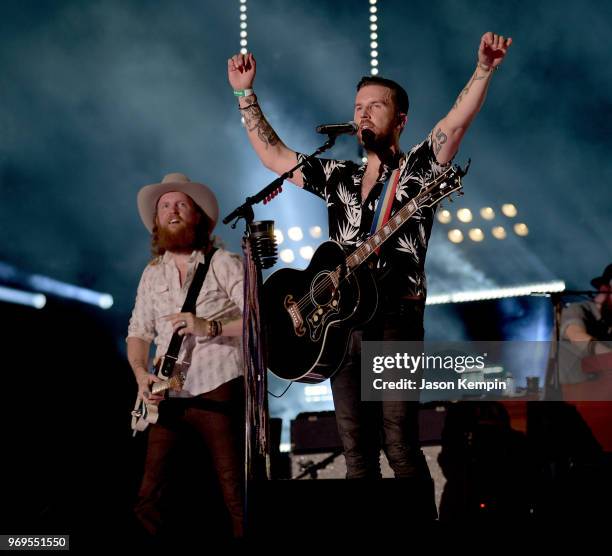 John Osborne and T.J. Osborne of musical duo Brothers Osborne perform onstage during the 2018 CMA Music festival at the Nissan Stadium on June 7,...