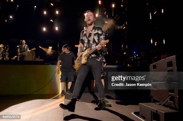 Osborne of musical duo Brothers Osborne performs onstage during the 2018 CMA Music festival at the Nissan Stadium on June 7, 2018 in Nashville,...