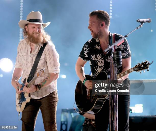 John Osborne and T.J. Osborne of musical duo Brothers Osborne perform onstage during the 2018 CMA Music festival at the Nissan Stadium on June 7,...