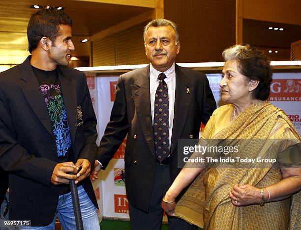 Tushar Khandekar , mid-fielder of the Indian Hockey team, Mrs. Vidya Stokes , vice-president, Indian Olympic Association and an ex-Olympian of Indian...