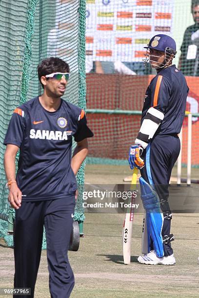 Ashish Nehra and Virender Sehwag during a training session at The Sawai Mansingh Cricket Stadium in Jaipur on February 20, 2010.