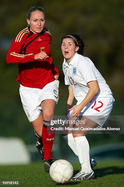 Kristina Gessat of Germany and Brooke Chaplen of England compete for the ball during the Women's international friendly match between Germany and...