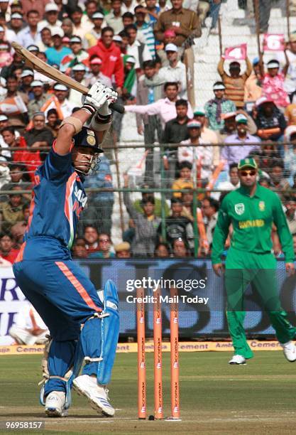 Sachin Tendulkar hits a shot during the one day international cricket match between India and South Africa in Jaipur on Feb. 21, 2010. India won the...