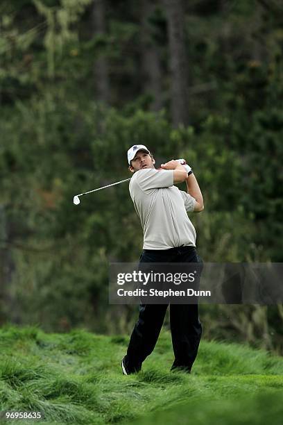 Dallas Cowboys quarterback Tony Romo hits his tee shot on the 12th hole during the second round of the AT&T Pebble Beach National Pro-Am at Spyglass...