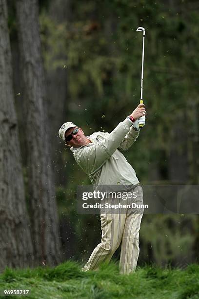 John Daly hits his tee shot on the 12th hole during the second round of the AT&T Pebble Beach National Pro-Am at Spyglass Hill Golf Course on...