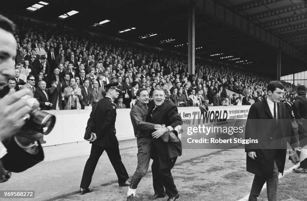 English soccer player Peter Osgood hugs Chelsea FC manager Tommy Docherty after winning FA Cup semi-finals against Leeds United FC, Villa Park,...