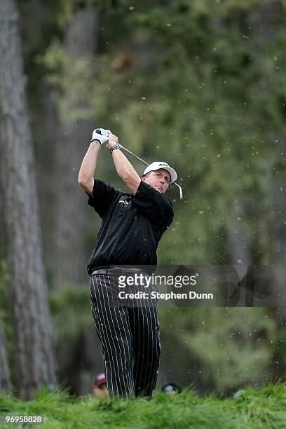 Phil Mickelson hits his tee shot on the 12th hole during the second round of the AT&T Pebble Beach National Pro-Am at Spyglass Hill Golf Course on...