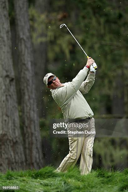 John Daly hits his tee shot on the 12th hole during the second round of the AT&T Pebble Beach National Pro-Am at Spyglass Hill Golf Course on...