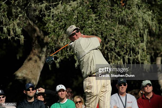 John Daly hits his tee shot on the eighth hole during the second round of the AT&T Pebble Beach National Pro-Am at Spyglass Hill Golf Course on...