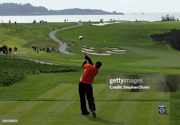 Holmes hits his tee shot on the sixth hole during the first round of the AT&T Pebble Beach National Pro-Am at Pebble Beach Golf Links on February 11,...