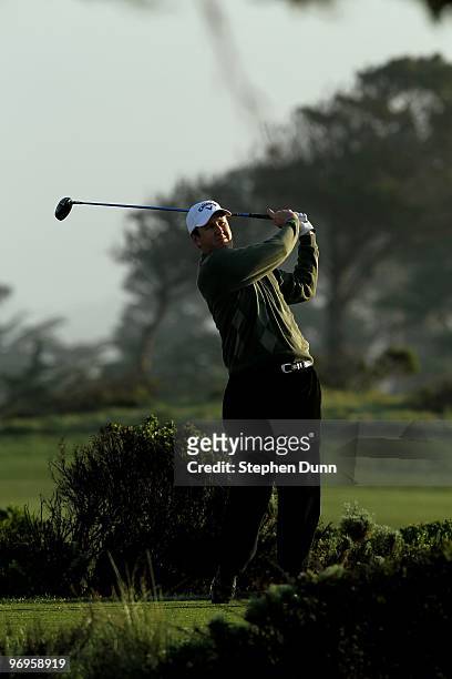 Henry hits his tee shot on the 10th hole during the third round of the AT&T Pebble Beach National Pro-Am at Monterey Peninsula Country Club on...