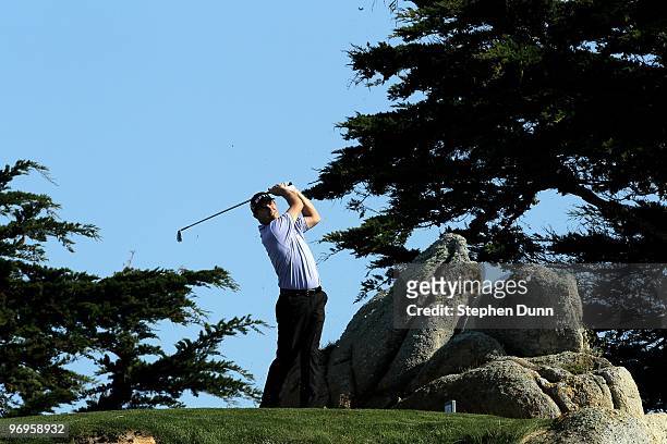 Padraig Harrington of Ireland hits his tee shot on the 11th hole during the third round of the AT&T Pebble Beach National Pro-Am at Monterey...