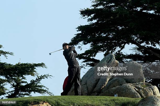 Adam Scott of Australia hits his tee shot on the 11th hole during the third round of the AT&T Pebble Beach National Pro-Am at Monterey Peninsula...