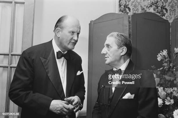 British organist, conductor and composer Thomas Armstrong and British conductor and cellist John Barbirolli at a dinner organised by the Royal...