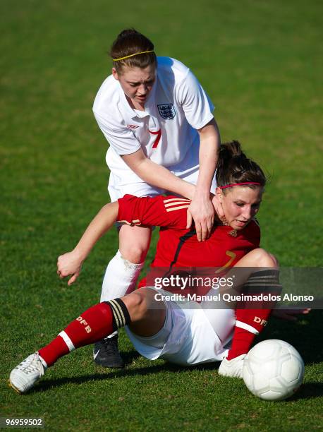 Jessica Wich of Germany and Jade Moore of England compete for the ball during the Women's international friendly match between Germany and England on...