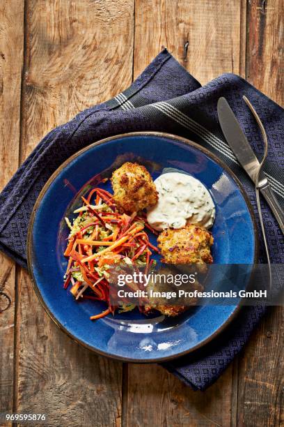 chicken nuggets with a dip and a raw vegetable salad - chicken nuggets ストックフォトと画像