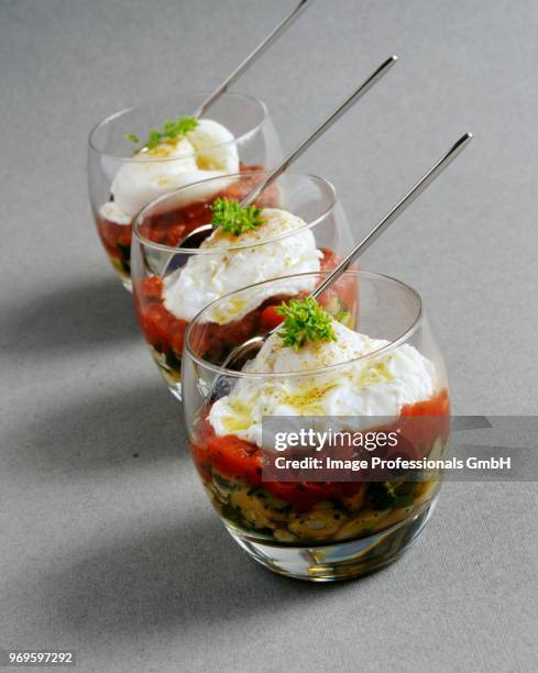 poached eggs,crushed tomatoes and fried cougettes with basil - crack spoon stock pictures, royalty-free photos & images