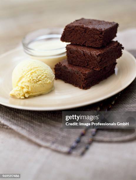 chocolate cake and vanilla ice cream - ice cream cake stock pictures, royalty-free photos & images