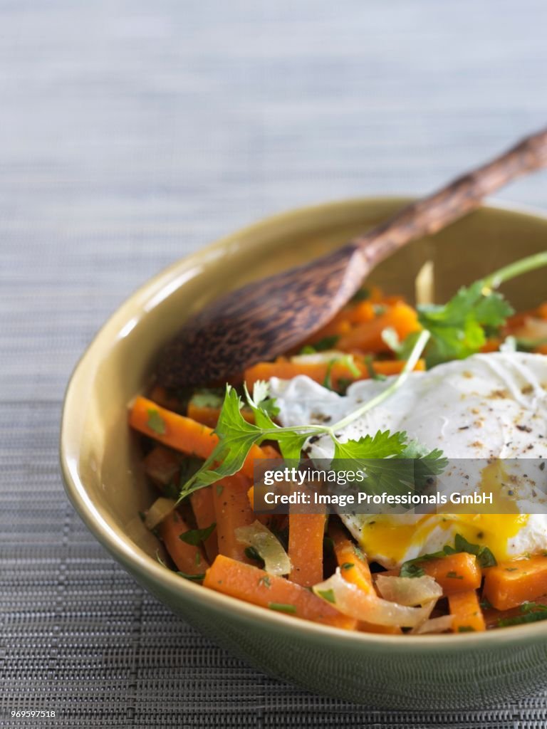 Carrot and confit lemon salad with poached egg