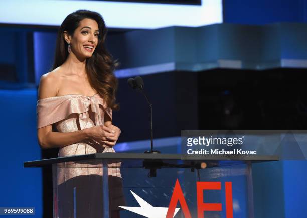 Amal Clooney speaks onstage at the American Film Institute's 46th Life Achievement Award Gala Tribute to George Clooney at Dolby Theatre on June 7,...