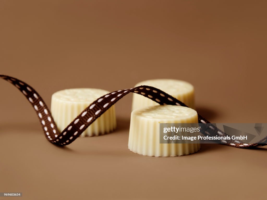 White chocolates and ribbon
